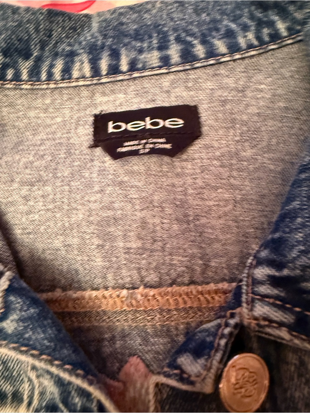 bebe Blue Distressed Denim Jacket with Embroidered Floral Accent - Picture 3 of 6